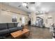 Cozy living room featuring tile floors, high ceilings, neutral paint and comfortable seating at 1147 N Marvin St, Gilbert, AZ 85233