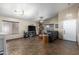 Spacious living room featuring tile flooring, high ceilings, bright windows, and ample space for entertaining at 1147 N Marvin St, Gilbert, AZ 85233
