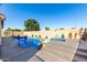 Inviting backyard with pool, spa, and desert-inspired landscaping, creating a serene outdoor retreat at 1147 N Marvin St, Gilbert, AZ 85233