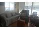 Cozy living room with comfortable seating and a well lit window at 1311 W Chesapeake Dr, Apache Junction, AZ 85119