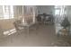 Outdoor patio area featuring a large glass table and comfortable seating for entertaining at 1311 W Chesapeake Dr, Apache Junction, AZ 85119
