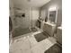Bathroom with a glass shower, vanity, and tiled floors at 135 S Abalone Dr, Gilbert, AZ 85233