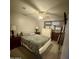 Bedroom with neutral colors, ceiling fan, and two bedside tables at 135 S Abalone Dr, Gilbert, AZ 85233