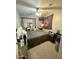 Bedroom with a queen sized bed, a desk with a mirror, and luggage at 135 S Abalone Dr, Gilbert, AZ 85233