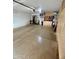 Clean and spacious garage with speckled floors and built-in cabinets providing ample storage space at 135 S Abalone Dr, Gilbert, AZ 85233