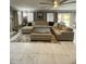 Spacious living room with a comfortable sectional sofa and natural light at 135 S Abalone Dr, Gilbert, AZ 85233