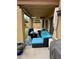 Covered patio with outdoor seating and fire pit, perfect for entertaining at 135 S Abalone Dr, Gilbert, AZ 85233