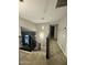 Carpeted stairway with dark wooden handrails and metal accents at 135 S Abalone Dr, Gilbert, AZ 85233