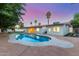 Backyard with a pristine pool and lush landscaping, perfect for outdoor relaxation at 1532 W Northern Ave, Phoenix, AZ 85021