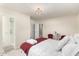 Bedroom with en-suite bathroom features stylish decor, creating a comfortable and convenient living space at 1532 W Northern Ave, Phoenix, AZ 85021