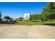 Community basketball court with well-maintained surface and surrounding green space at 15422 W Ventura St, Surprise, AZ 85379
