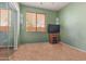 Spare bedroom features neutral carpeting, shelving and mirrored closet at 15422 W Ventura St, Surprise, AZ 85379
