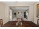 Dining room featuring a wood table with seating for six and views to the Gathering room at 15422 W Ventura St, Surprise, AZ 85379