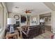 Living room features a fireplace, TV, comfortable seating, and a neutral color palette at 15422 W Ventura St, Surprise, AZ 85379