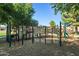 Community playground featuring slides, climbing structures, and various play areas for children to enjoy at 15422 W Ventura St, Surprise, AZ 85379