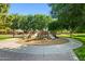 Community playground area with multiple slides and climbing structures at 15422 W Ventura St, Surprise, AZ 85379