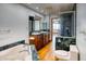 Well-lit bathroom with dual sinks, shower, soaking tub and a stylish vanity at 1550 N Stapley Dr # 6, Mesa, AZ 85203