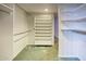 Walk-in closet with shelving and ample storage space for an organized wardrobe and belongings at 1550 N Stapley Dr # 6, Mesa, AZ 85203