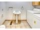 Functional laundry room with a pedestal sink, tile floors, and a white washing machine and dryer at 1550 N Stapley Dr # 6, Mesa, AZ 85203