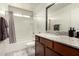 Bathroom featuring single sink vanity with granite countertops and shower/tub combination at 16415 W Oyer Ln, Surprise, AZ 85387