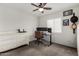 Bedroom area with desk and chair for work station in natural light at 16415 W Oyer Ln, Surprise, AZ 85387