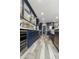 A modern kitchen featuring stainless appliances, wine fridge and amazing designer features at 1656 W Meseto Cir, Mesa, AZ 85202