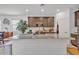 Spacious kitchen features a large center island, stainless steel appliances, and ample cabinet space at 18100 W College Dr, Goodyear, AZ 85395