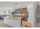 Modern kitchen featuring a kitchen island, stylish cabinets, stainless steel appliances, and lots of storage at 18100 W College Dr, Goodyear, AZ 85395