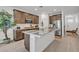 Modern kitchen with stainless steel appliances and a glass island at 18100 W College Dr, Goodyear, AZ 85395