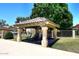 Community gazebo with tile roof, chairs, pillars, and well-maintained landscaping at 1861 E Bendix Dr, Tempe, AZ 85283