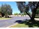 View of the neighborhood street with manicured lawns and mature trees at 1861 E Bendix Dr, Tempe, AZ 85283