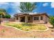 Expansive backyard with patio and new landscaping potential surrounded by tall fence at 18719 E Pelican Ct, Queen Creek, AZ 85142