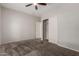 Bedroom space with large closet and entry to another room ready for customization at 18719 E Pelican Ct, Queen Creek, AZ 85142