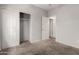 Neutral bedroom with attached closet space is a blank canvas for personalization at 18719 E Pelican Ct, Queen Creek, AZ 85142