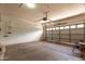 Spacious two car garage with overhead lighting, storage space and automatic garage door opener at 18719 E Pelican Ct, Queen Creek, AZ 85142