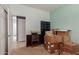 Light-filled bedroom featuring carpeted floors and ample storage for personal belongings at 19667 N 260Th N Ln, Buckeye, AZ 85396