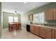 Combined kitchen and dining area with tile floors and a ceiling fan at 19667 N 260Th N Ln, Buckeye, AZ 85396