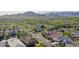 Scenic aerial view of a neighborhood, showcasing mountain scenery and residential homes at 20510 W White Rock Rd, Buckeye, AZ 85396
