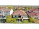 Aerial view of a backyard with a pergola, artificial grass, and desert landscaping at 20510 W White Rock Rd, Buckeye, AZ 85396