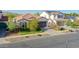 Charming single-Gathering home with a terracotta tile roof, green lawn and beautiful desert landscaping at 20510 W White Rock Rd, Buckeye, AZ 85396