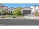Lovely single-story home featuring a two-car garage, mature landscaping, and a beautiful tile roof at 20510 W White Rock Rd, Buckeye, AZ 85396