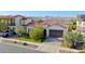 Beautiful single-story home showcasing desert landscaping and a charming tile roof at 20510 W White Rock Rd, Buckeye, AZ 85396