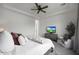 Cozy main bedroom with a king-size bed, accent pillows, and a view of a flat screen TV at 20510 W White Rock Rd, Buckeye, AZ 85396