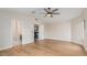 Bright bedroom showcasing wood floors and a contemporary ceiling fan at 20929 N 37Th Way, Phoenix, AZ 85050