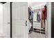 Walk in closet with organizers and lots of space to hang clothes and organize items at 20977 N 84Th Ln, Peoria, AZ 85382
