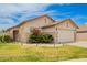Charming single-story home with desert landscaping and a well-maintained front yard at 20977 N 84Th Ln, Peoria, AZ 85382