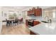 Open concept kitchen with stainless steel appliances, bright countertops, and seamless access to dining area at 20977 N 84Th Ln, Peoria, AZ 85382
