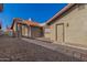 Backyard exterior showcasing stone and walkway at 2154 E Forge Ave, Mesa, AZ 85204