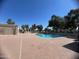 Community pool in a private setting with restroom and shower facilities at 2154 E Forge Ave, Mesa, AZ 85204