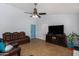 Spacious living room with a blue door and comfortable seating at 2154 E Forge Ave, Mesa, AZ 85204